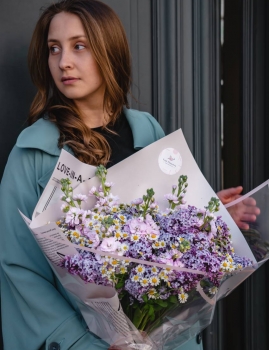 Lush bouquet with fragrant lilac, matiola and chamomile
